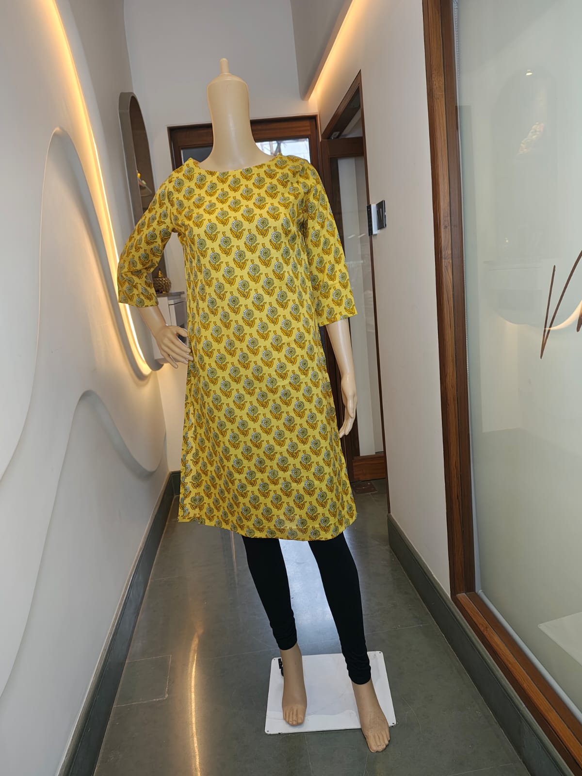 Golden Petals Printed Cotton Kurti – Soft Grace with a Burst of Yellow