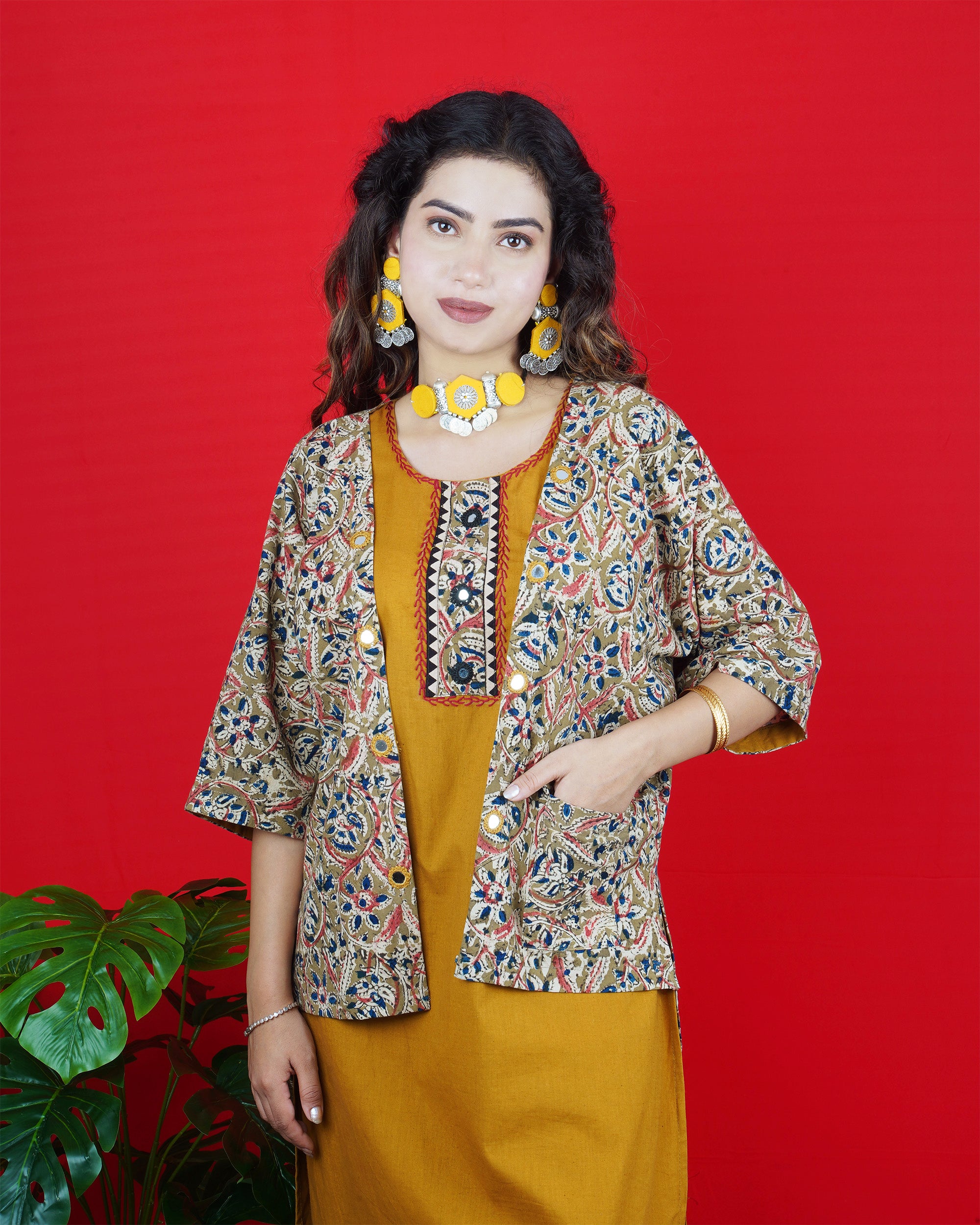 Mustard Yellow Sleeveless Kurta Set with Embroidered Neckline & Border Pants