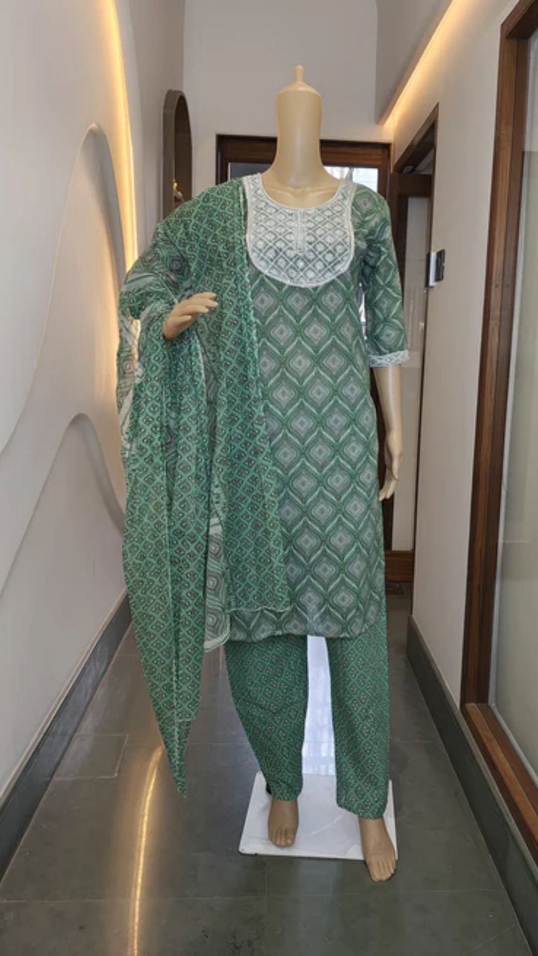 Bottle Green Floral Printed Cotton Punjabi Suit with Lace Neckline