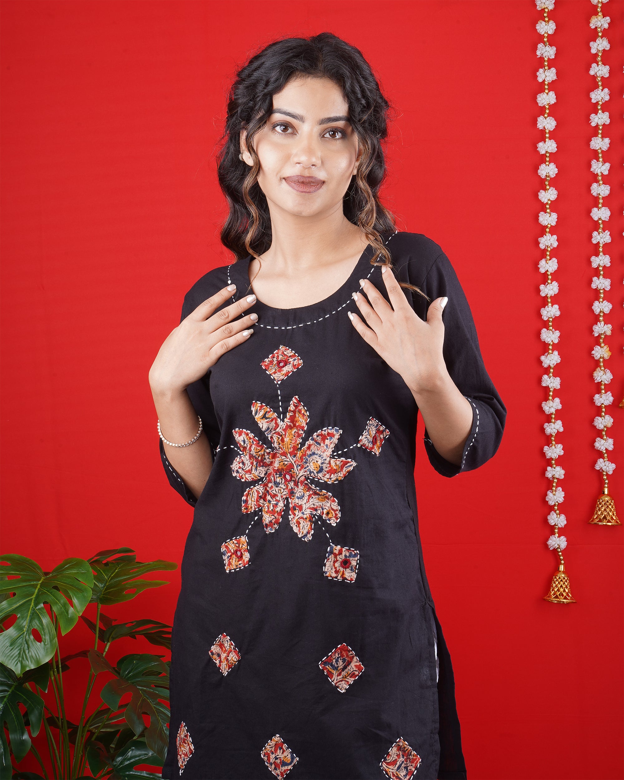 Black Short Kurti with Intricate Embroidered Motifs