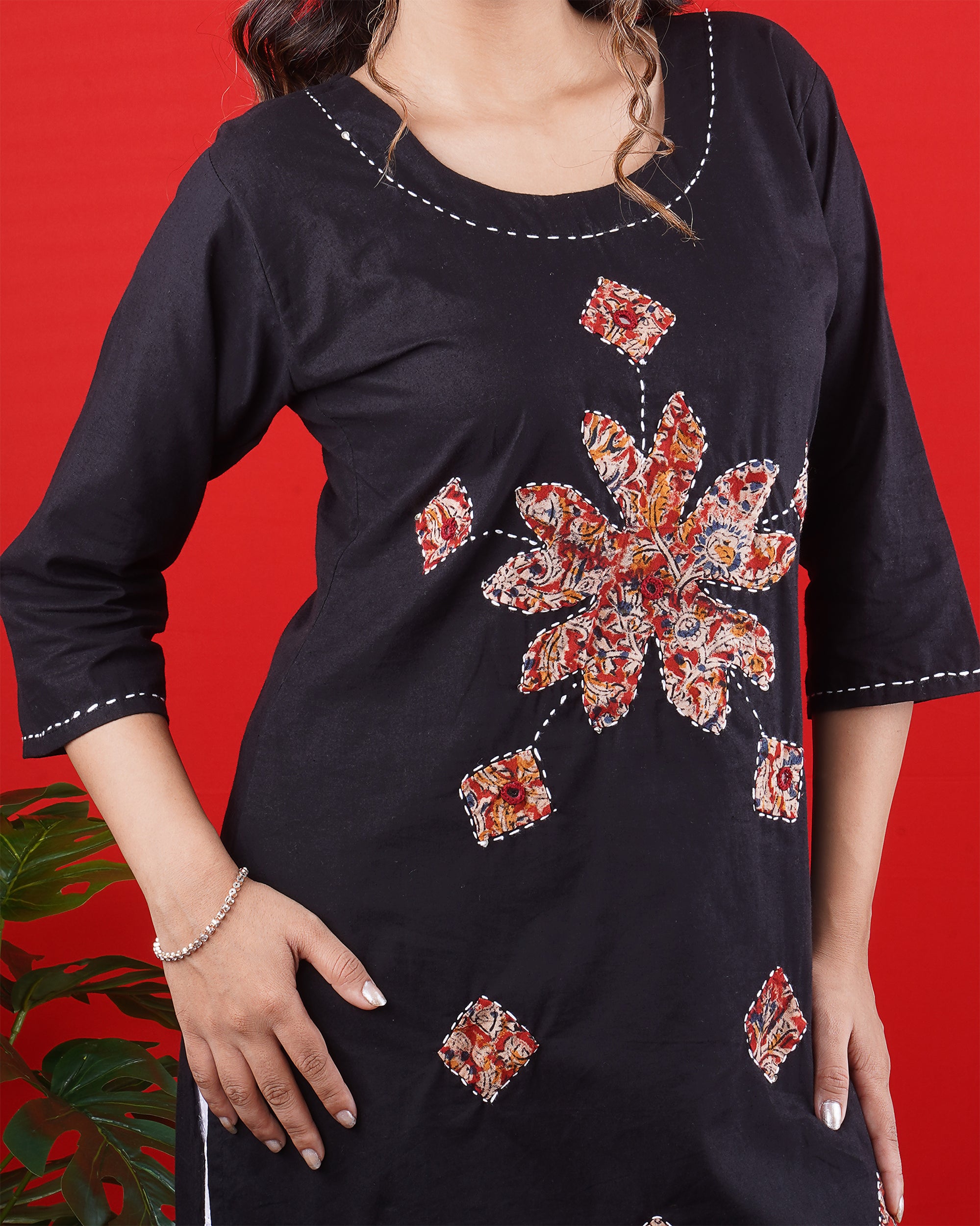 Black Short Kurti with Intricate Embroidered Motifs