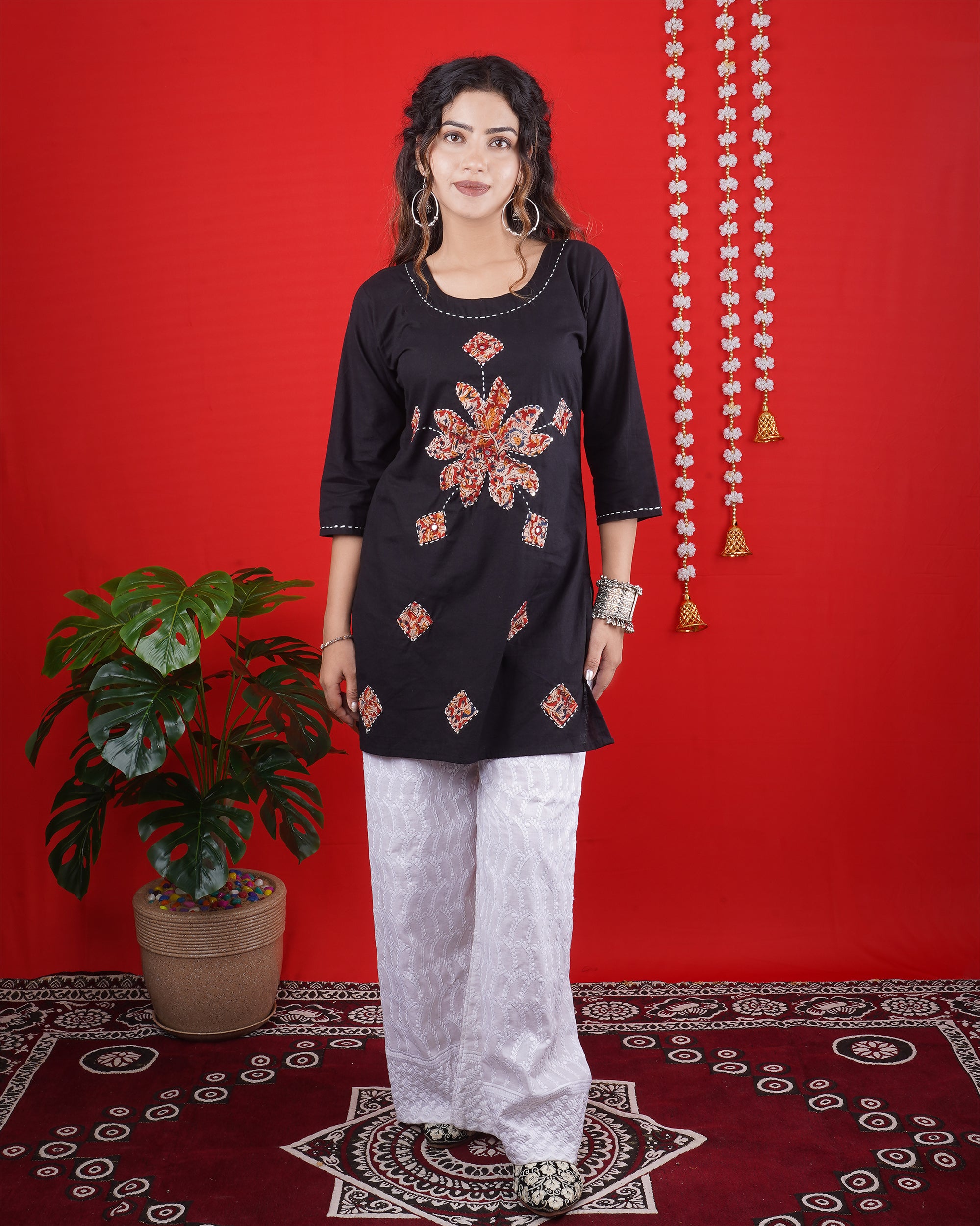 Black Short Kurti with Intricate Embroidered Motifs