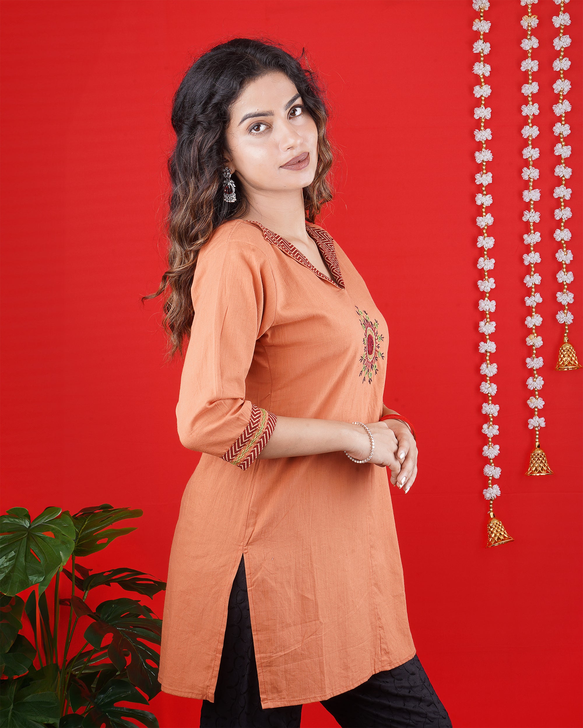 Peach Orange Short Kurti with Embroidered Neckline & Motif