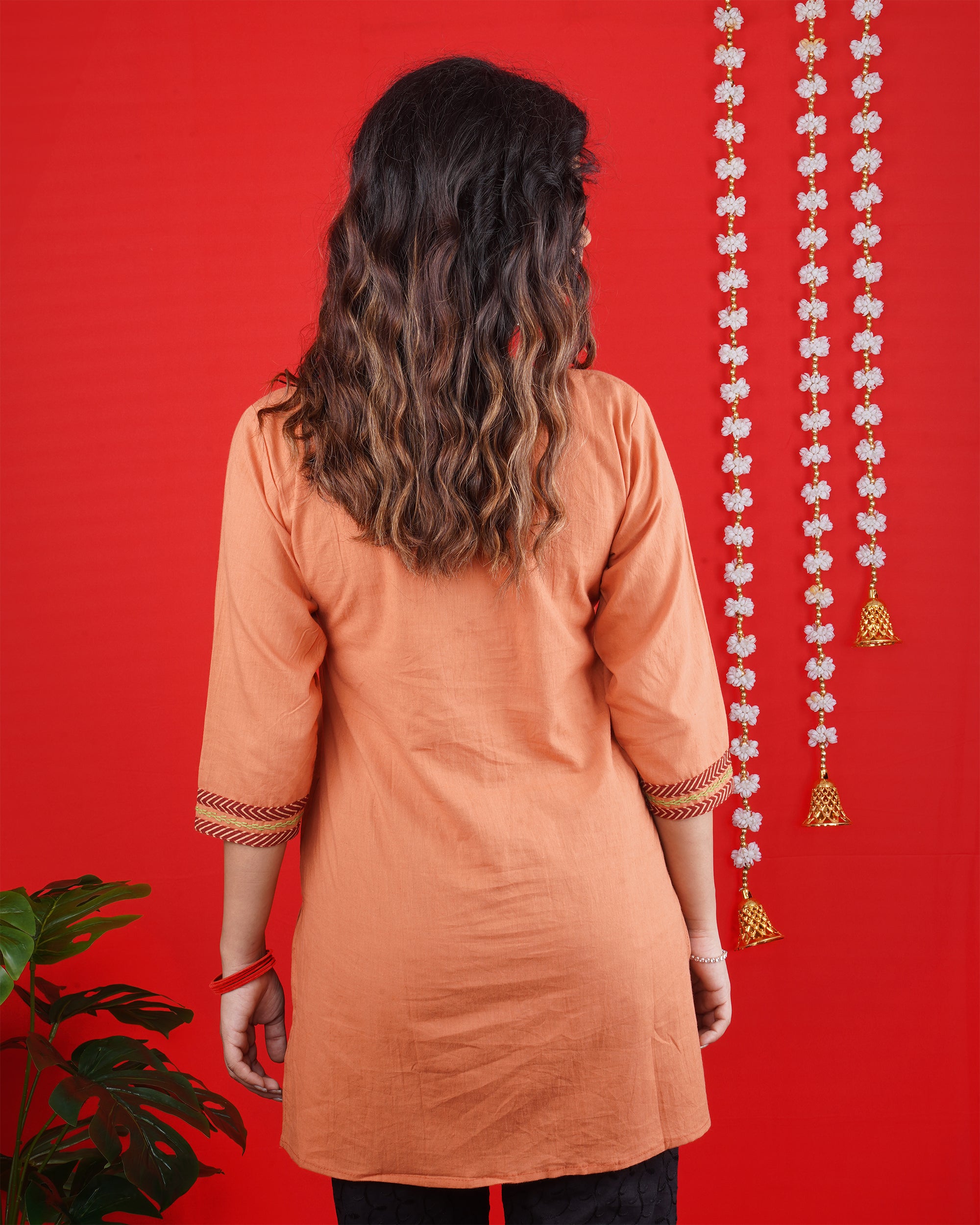 Peach Orange Short Kurti with Embroidered Neckline & Motif